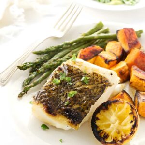 Grilled sea bass with sweet potatoes, asparagus.