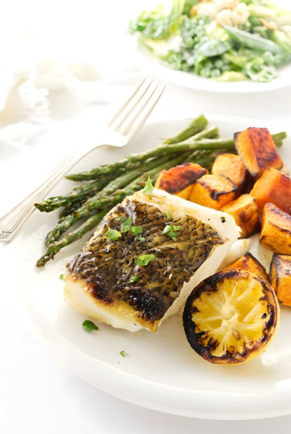Grilled sea bass with sweet potatoes, asparagus.