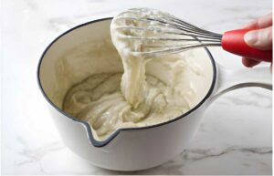 Making the boiled milk roux for ermine frosting.