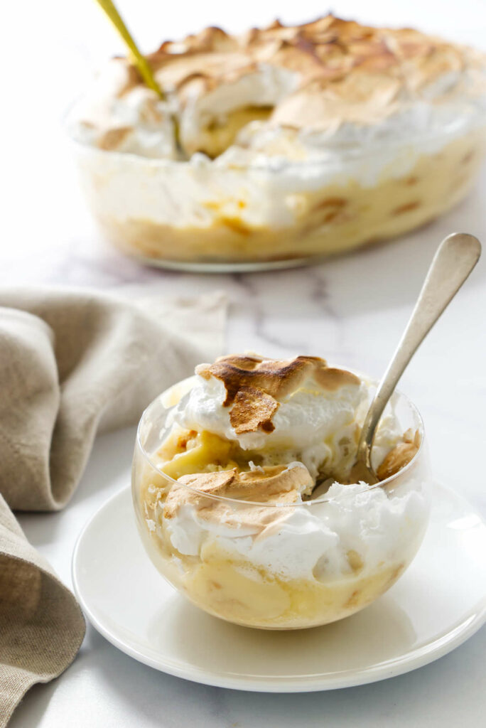 A chilled banana dessert with homemade pudding and nilla wafer cookies.