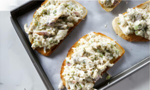 Crab salad mixture on toasted bread.