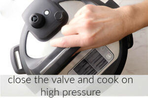 Placing a lid on the instant pot.