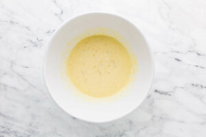 Mixing the liquid ingredients for pancakes.
