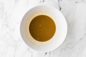 Blending the wet ingredients in a bowl.