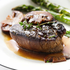 A steak diane recipe with mushrooms and cream butter sauce.
