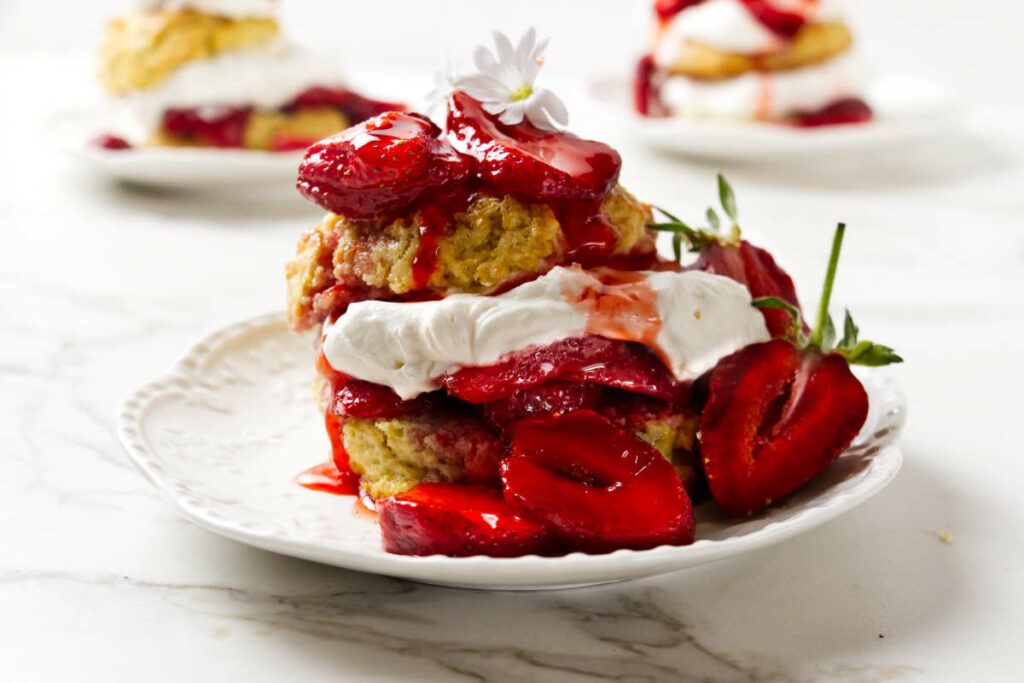 A strawberry shortcake made with sweet cream biscuits.