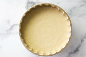 Cake batter in a baking pan.