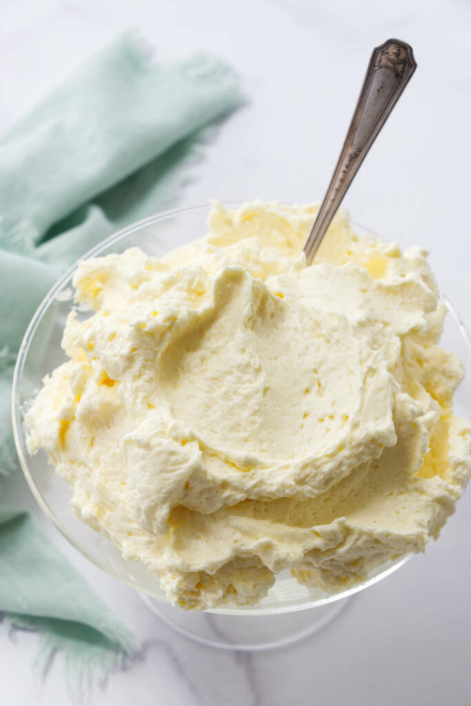 Butter-enriched pastry cream or French pastry cream in a dish with a spoon.