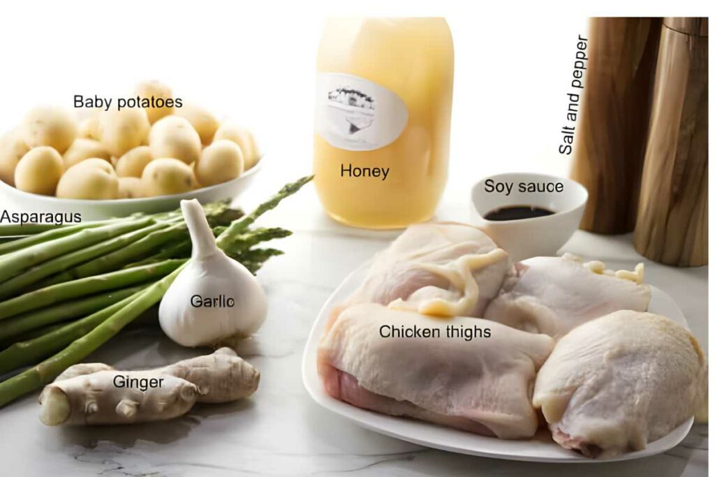Labeled raw chicken thighs, potatoes, asparagus, garlic, ginger, honey, soy sauce.