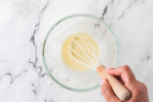 Mixing a glaze for the top of muffins.