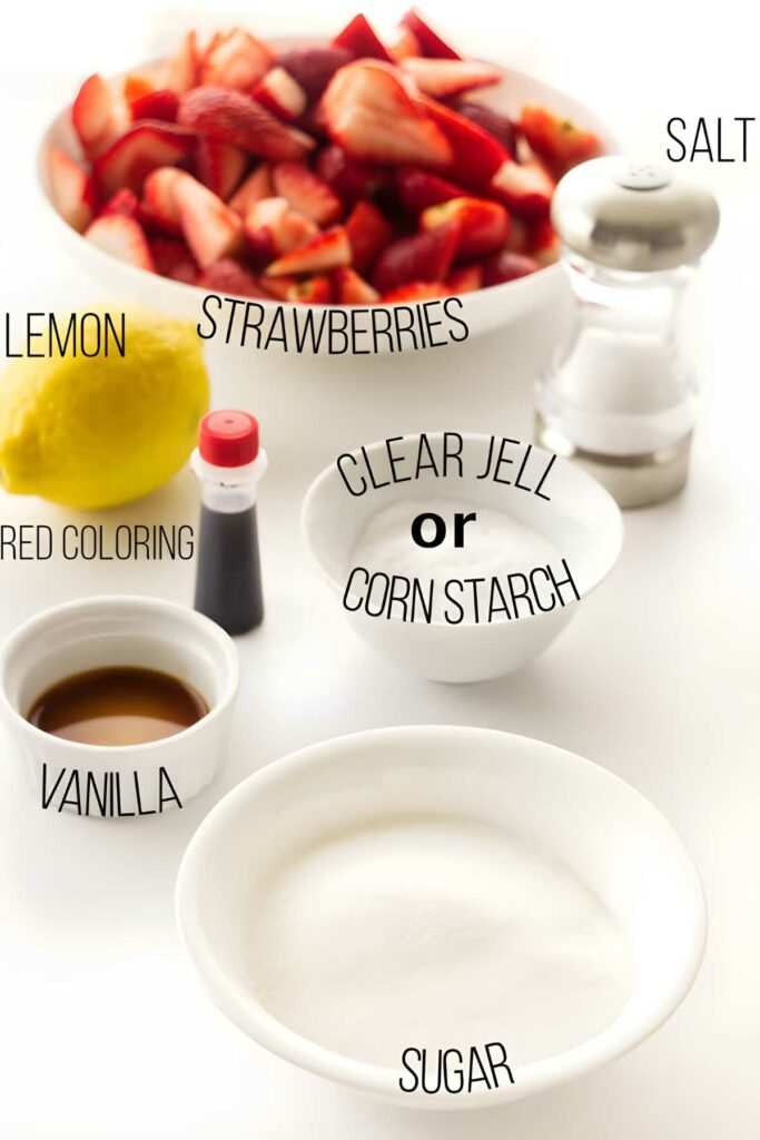 Labeled ingredients for strawberry dessert sauce to use as topping for cheesecake.