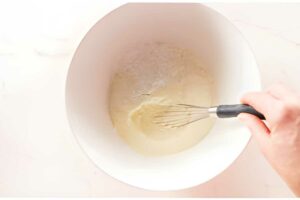 Combining dry ingredients for fry bread dough.
