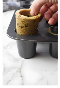 Removing cookie shooters from a mold.