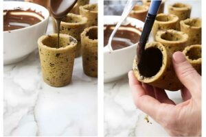 Coating cookie shooter with chocolate.