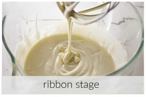 Whipping eggs and sugar to ribbon stage.