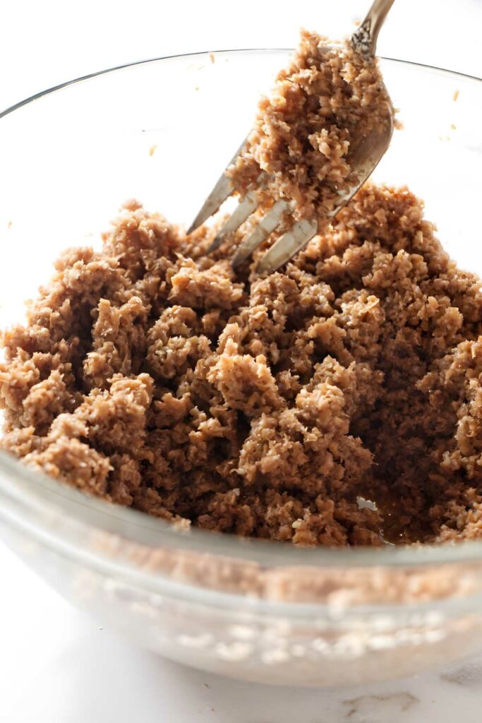 Glass bowl with moistened bran flakes. 