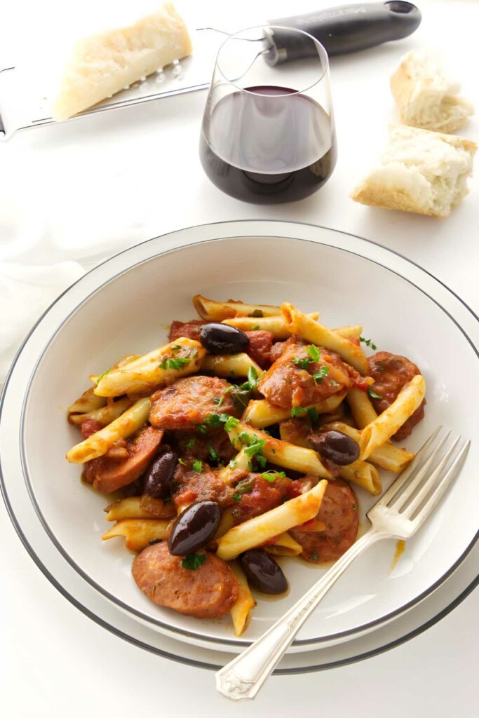 Penne pasta with spicy tomato sauce and sausage.