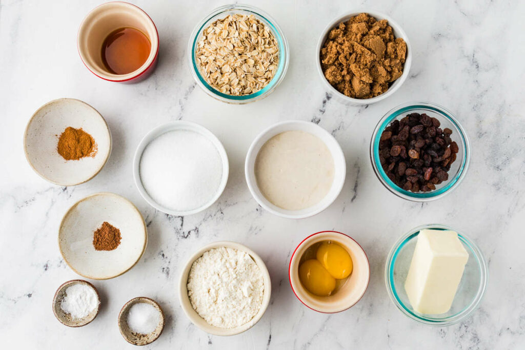 Ingredients used to make sourdough discard oatmeal cookies with raisins.