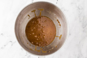 Mixing the wet ingredients for the cookie dough.