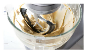 Creaming butter and sugar in a mixing bowl.