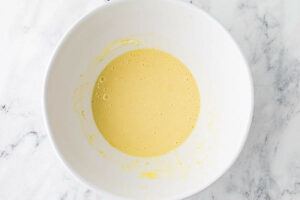 Mixing the liquid ingredients to make sourdough muffin batter.