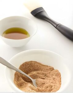 Blending a spice mixture in a bowl.