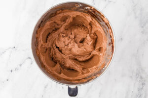 Chocolate buttercream in a mixing bowl.