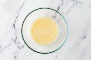 Blending the wet ingredients in a small dish.