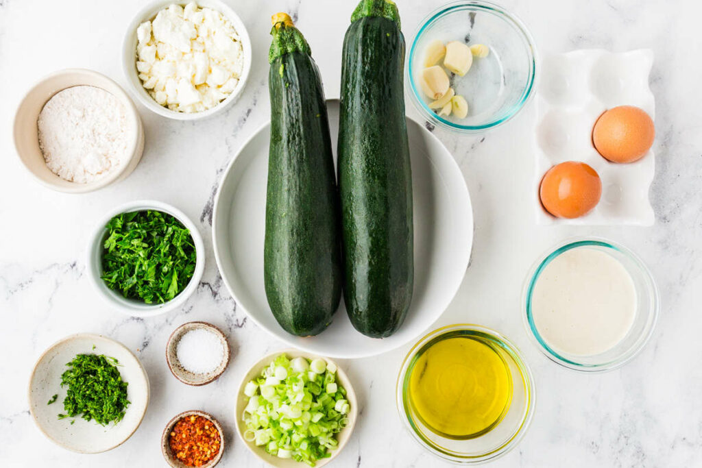 Ingredients used to make sourdough zucchini fritters.