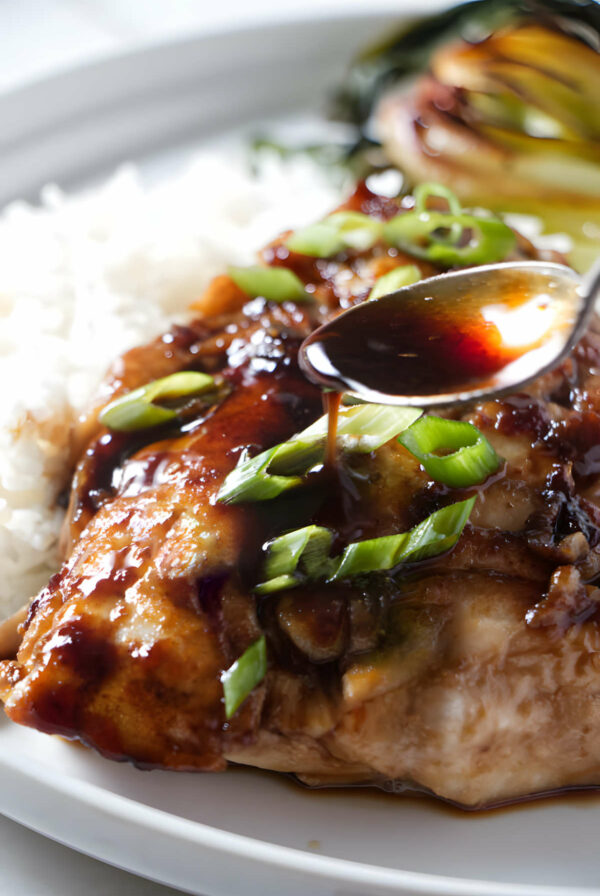 Spooning sauce over a pan seared rockfish fillet.