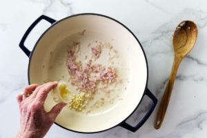 Garlic and shallots in a skillet.