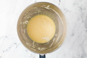 Blending ingredients for apple sourdough cake.