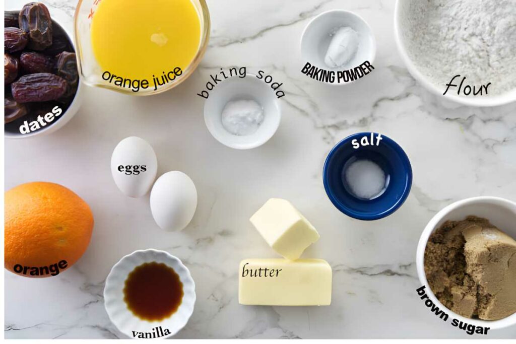 Top-down view of labeled baking ingredients arranged on a white surface.