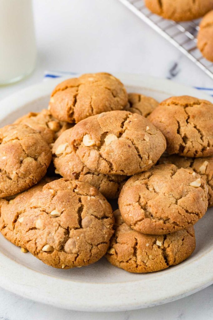A plate filled with peanut butter sourdough cookies.