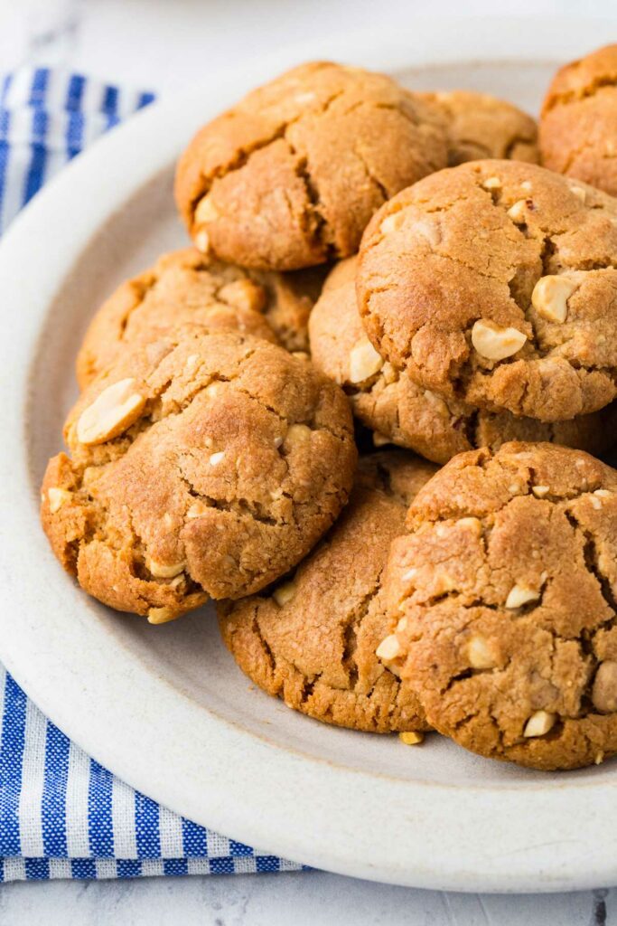 Sourdough peanut butter cookies on a white plate.