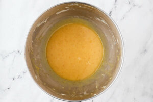 Mixing the cookie dough for the wet ingredients for snickerdoodles.