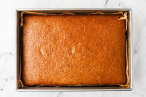 Freshly baked peanut butter cake in a 13 x 9 inch pan.