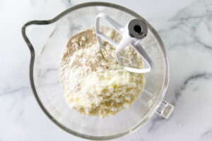 Mixing the dry ingredients in a bowl.