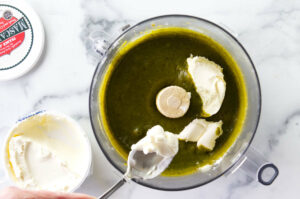 Adding mascarpone to the pistachio cream.