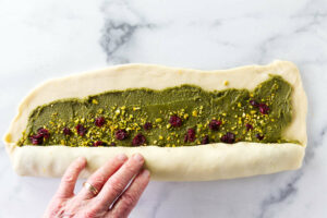 Rolling the dough into a log.
