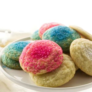 Plate of sprinkled cookies.