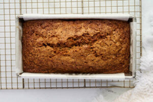 Cooling a carrot loaf cake on a wire rack.