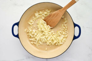 Sautéing onions in a skillet.
