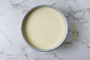 Transferring the cheesecake to an oven with no water bath.