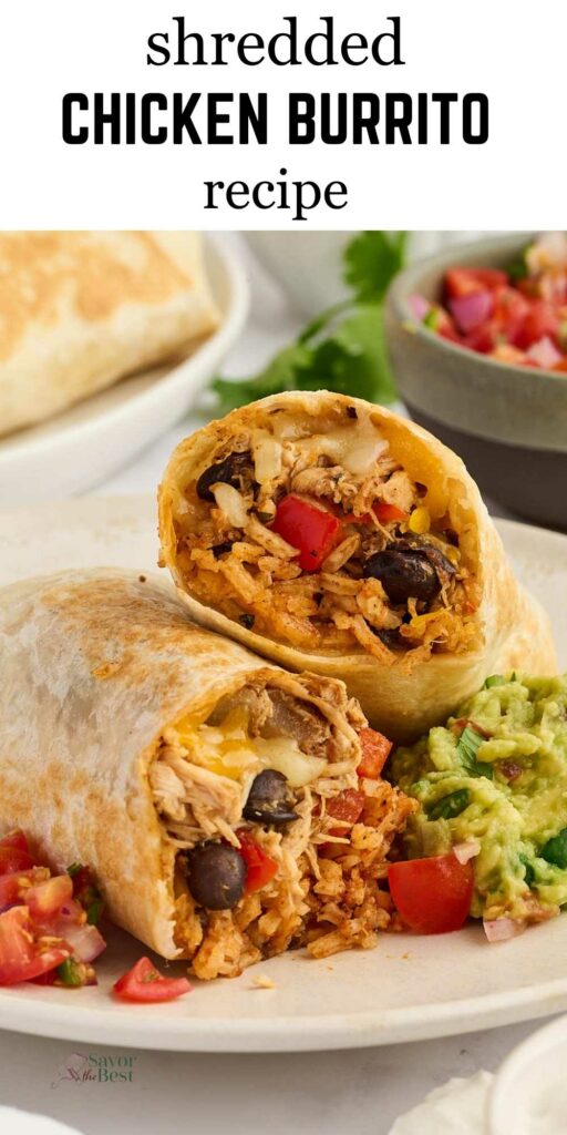 Chicken burrito halves with rice, beans, cheese; guacamole and salsa on plate.