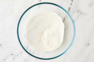 Blending the flour with the sugar and salt.