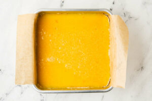 Freshly baked lemon bars in a baking pan.