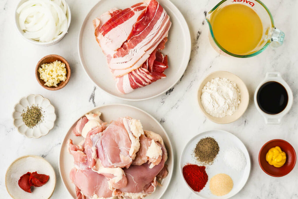 Ingredients used to make smothered chicken with bacon and onion gravy.