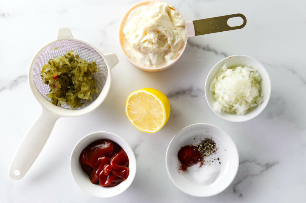 Ingredients used to make thousand island salad dressing.
