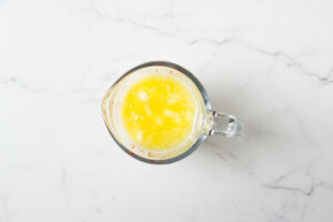 Warming the butter and milk mixture.